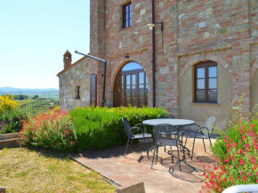 Apartment with 2 pools in the village of Asciano in the hills of Siena